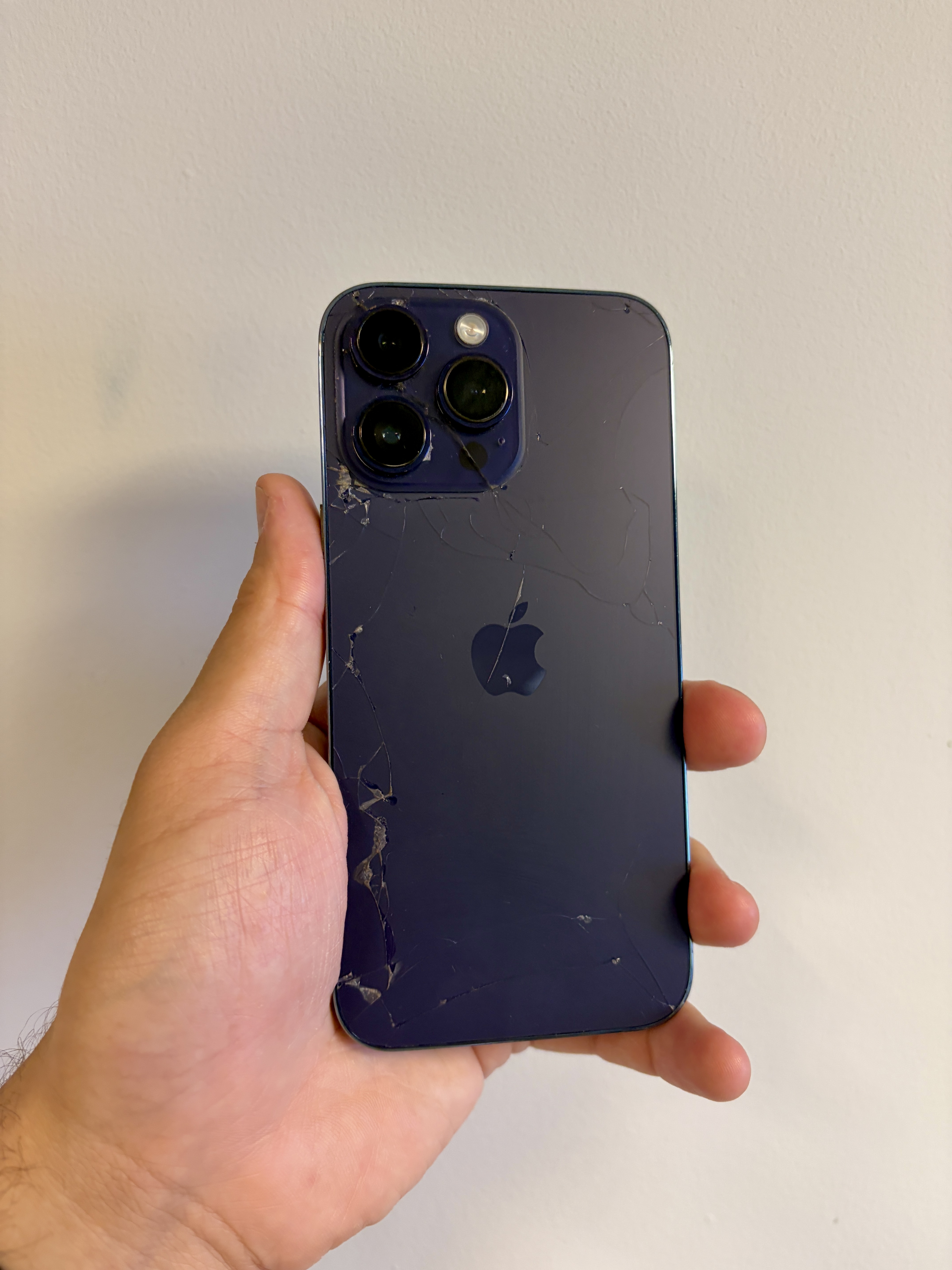 The Apple iPhone 14 Pro Max Purple 256GB 89pc Batt Health Cracked Screen eSIM Conver - Product View 5 available from Rouge Technologies